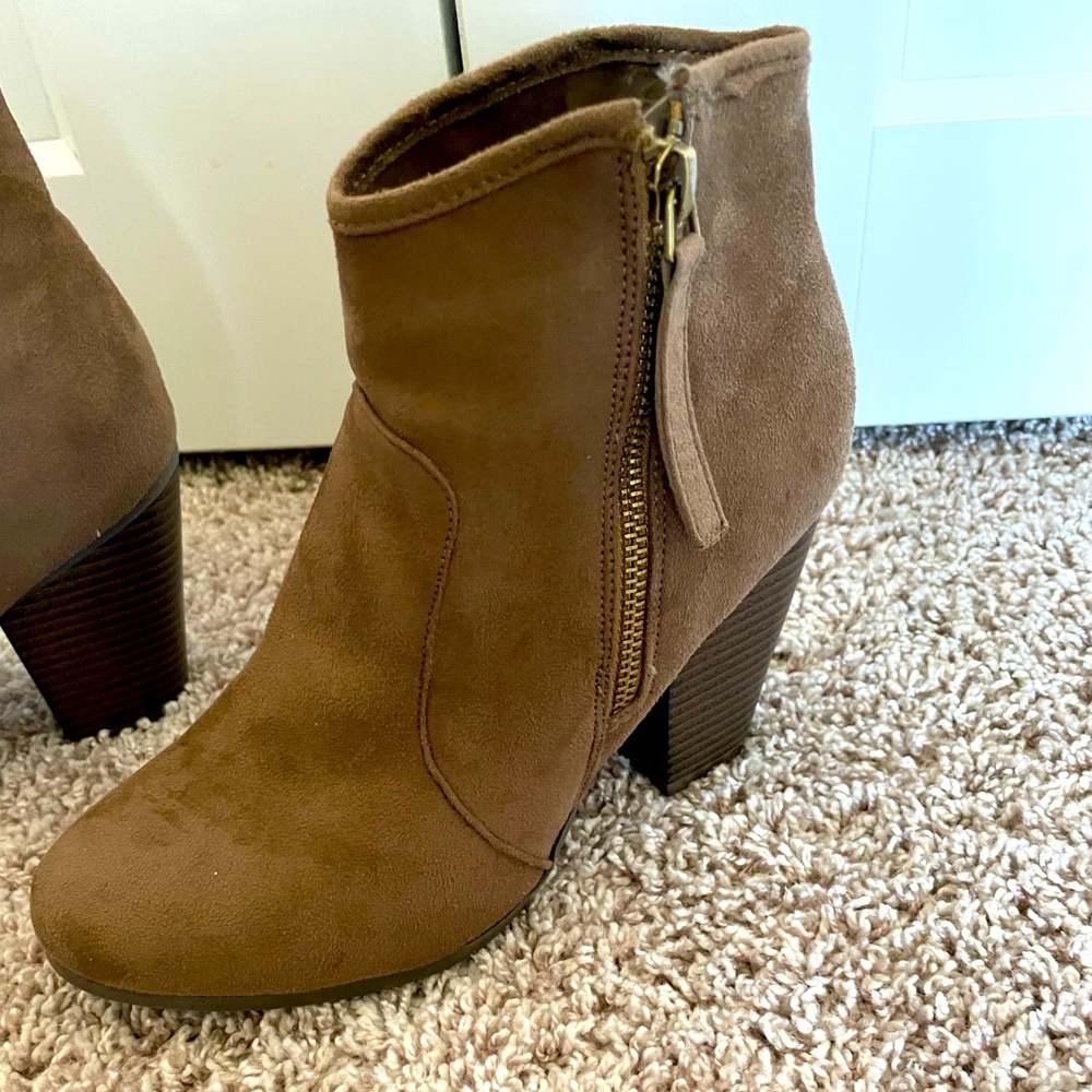 Worn once. Super comfortable heeled boot! 3 inch heel.